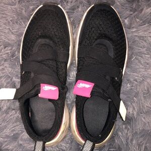 Women’s Black and Pink Athletic Shoes well worn